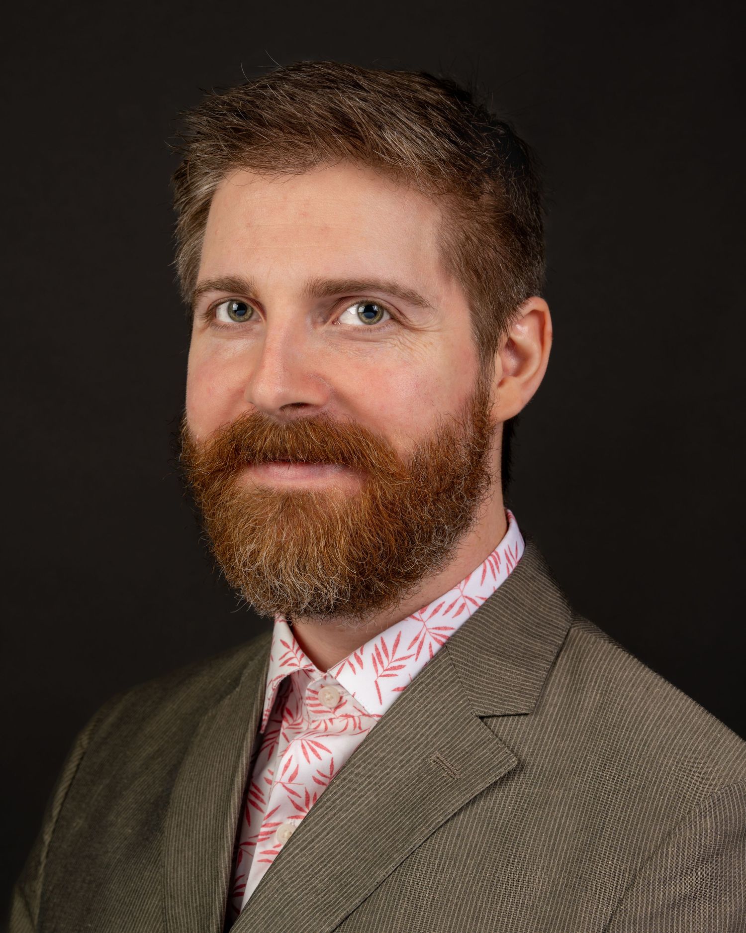 Professional corporate headshot photographed by Ted Warner Photography, Seattle area.