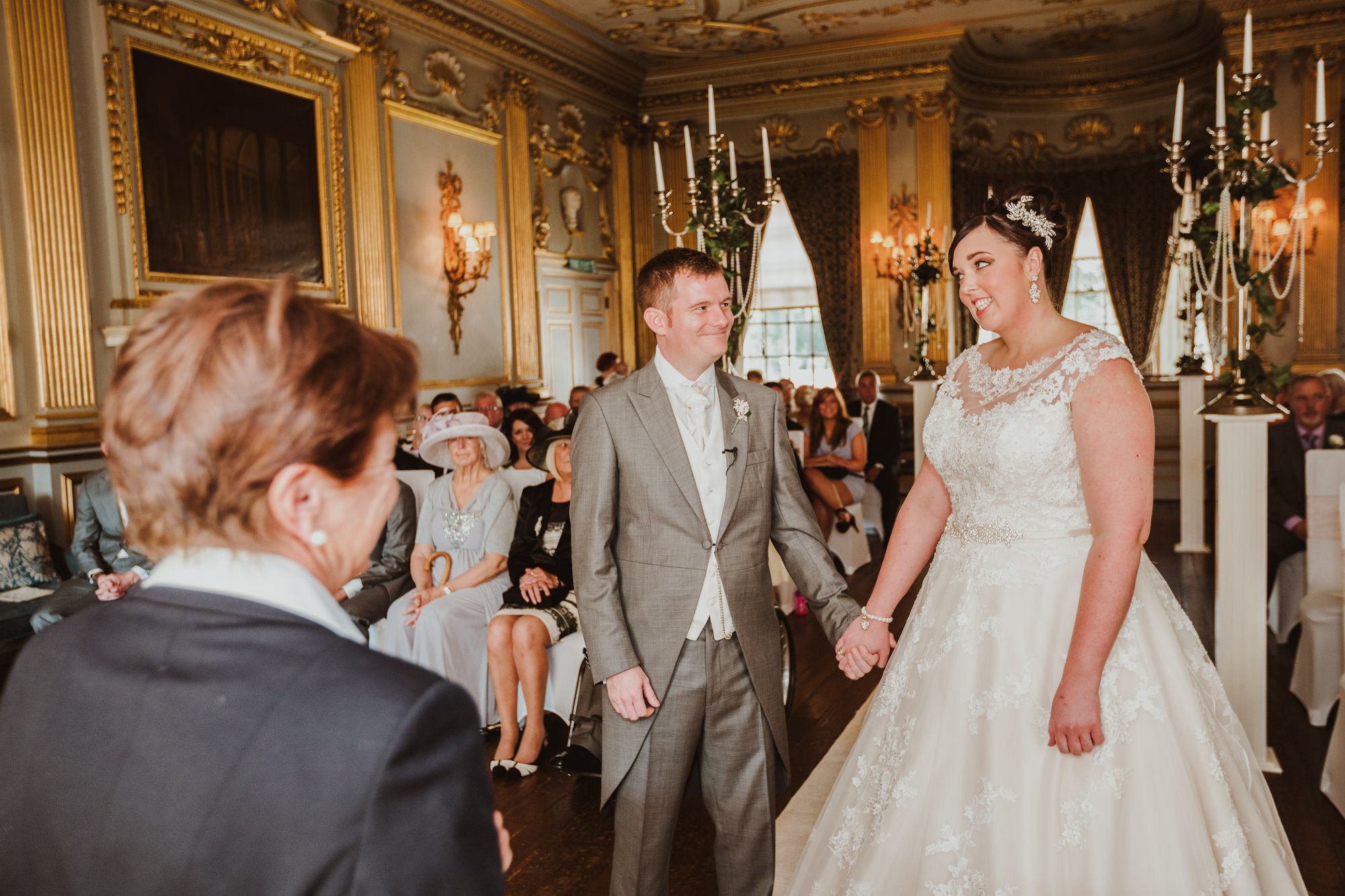 Nicola and Ashley during their wedding ceremony at Knowsley Hall