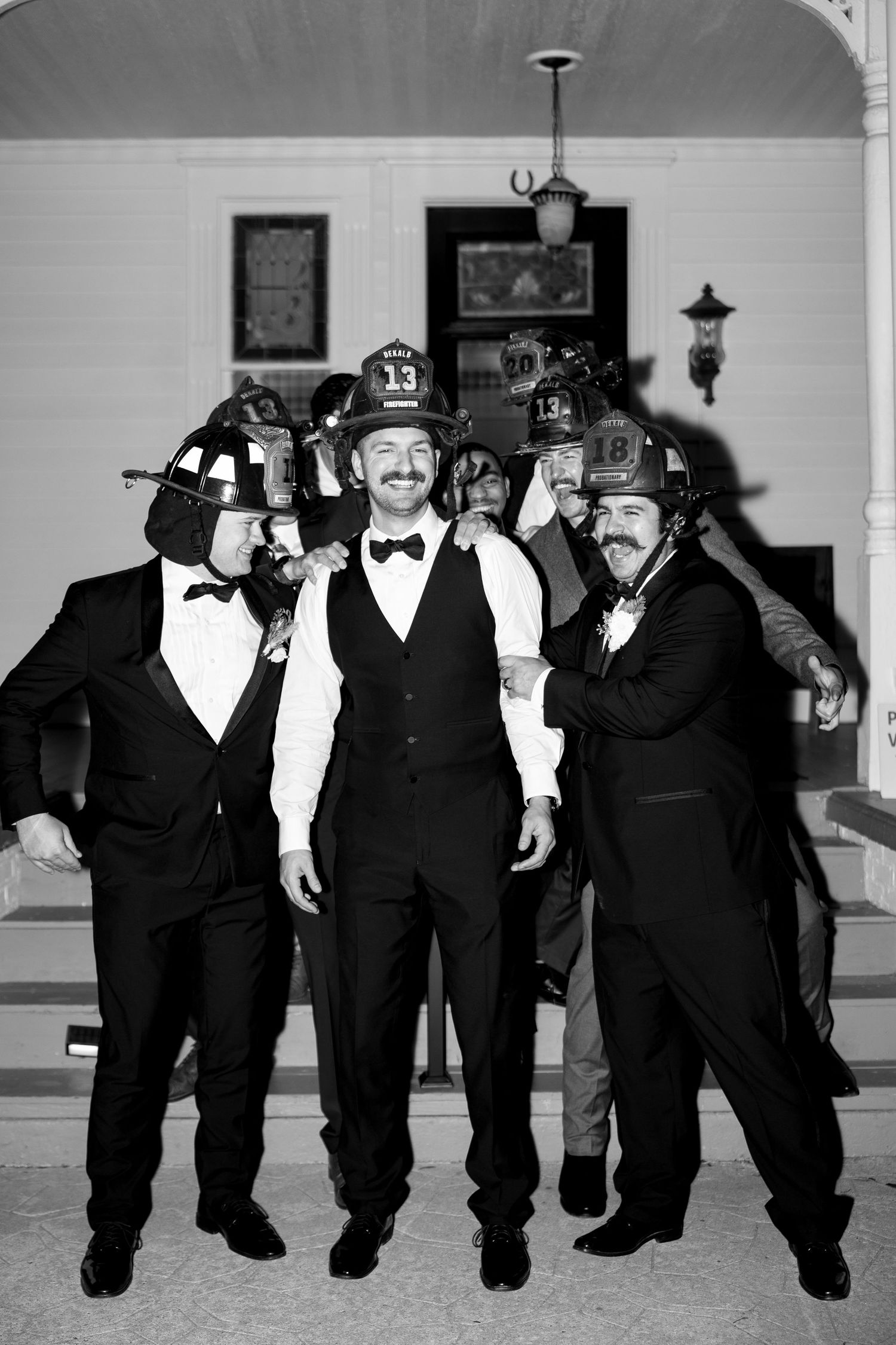 Groomsmen celebrating during reception at The Wildflower 301.