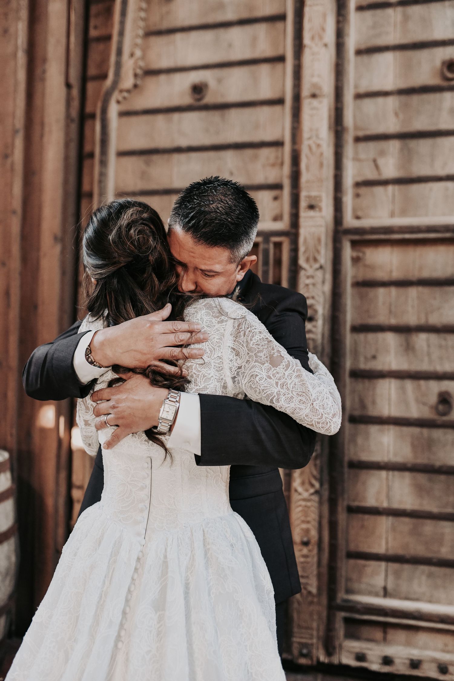 Dad seeing his daughter in her wedding gown for the first time