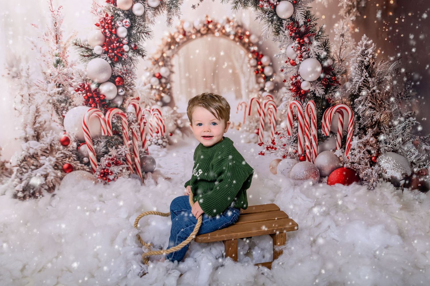 Sisters sat on bench at Christmas Photoshoot