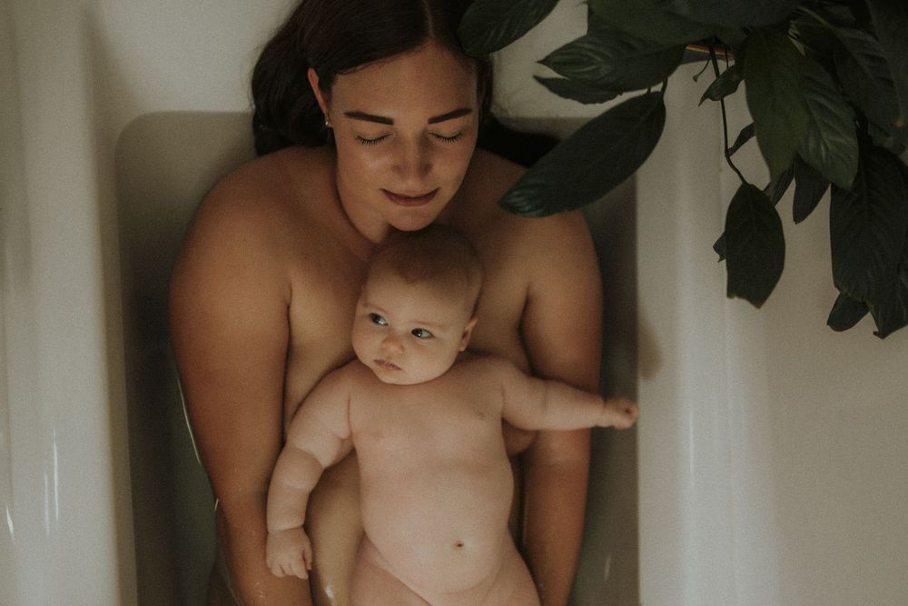 A quiet moment in the bathroom with houseplants creating a peaceful atmosphere.