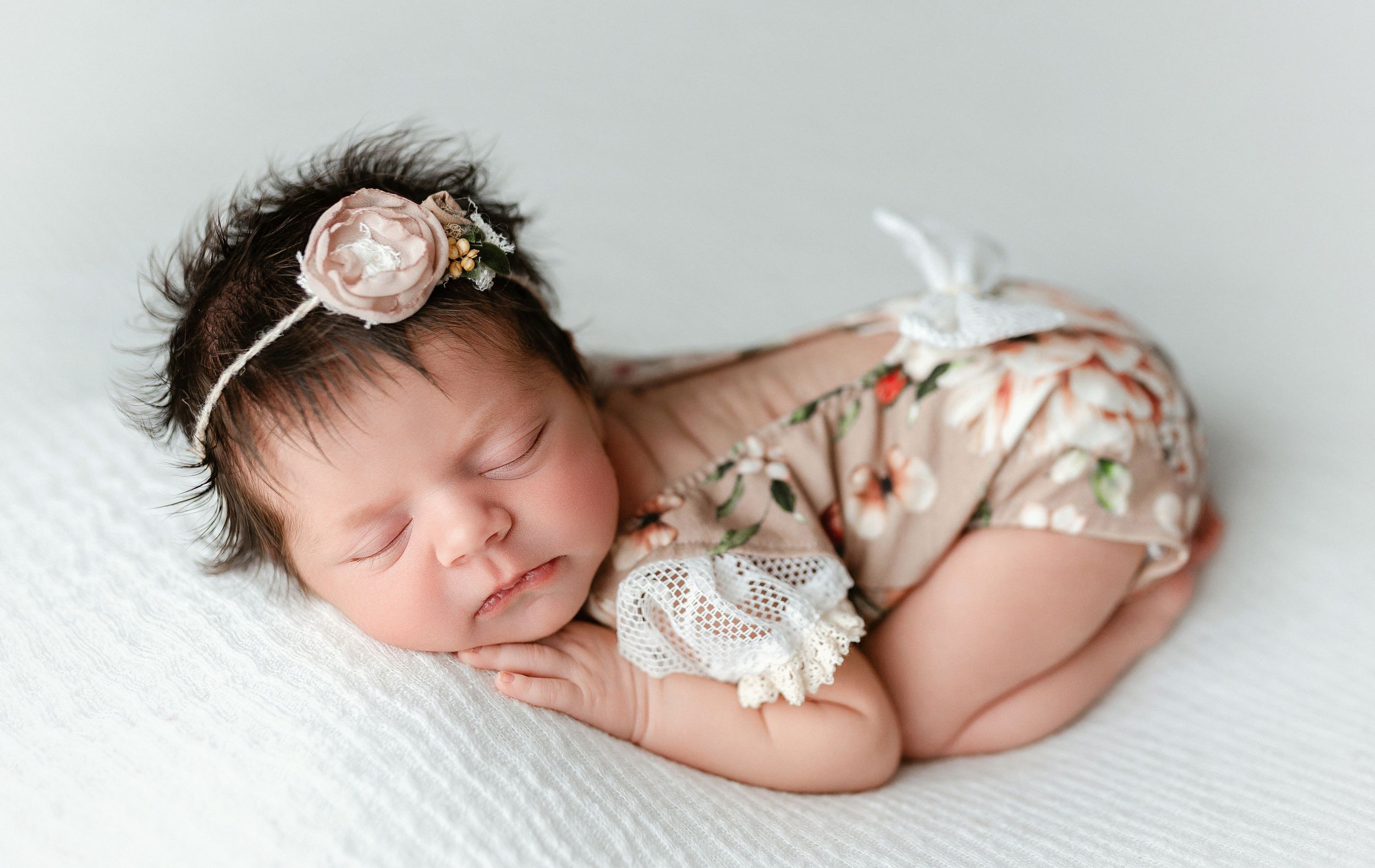 A newborn with a head full of hair doing the bum up pose. Greenville, SC newborn photographer, Easley, SC Newborn photographer