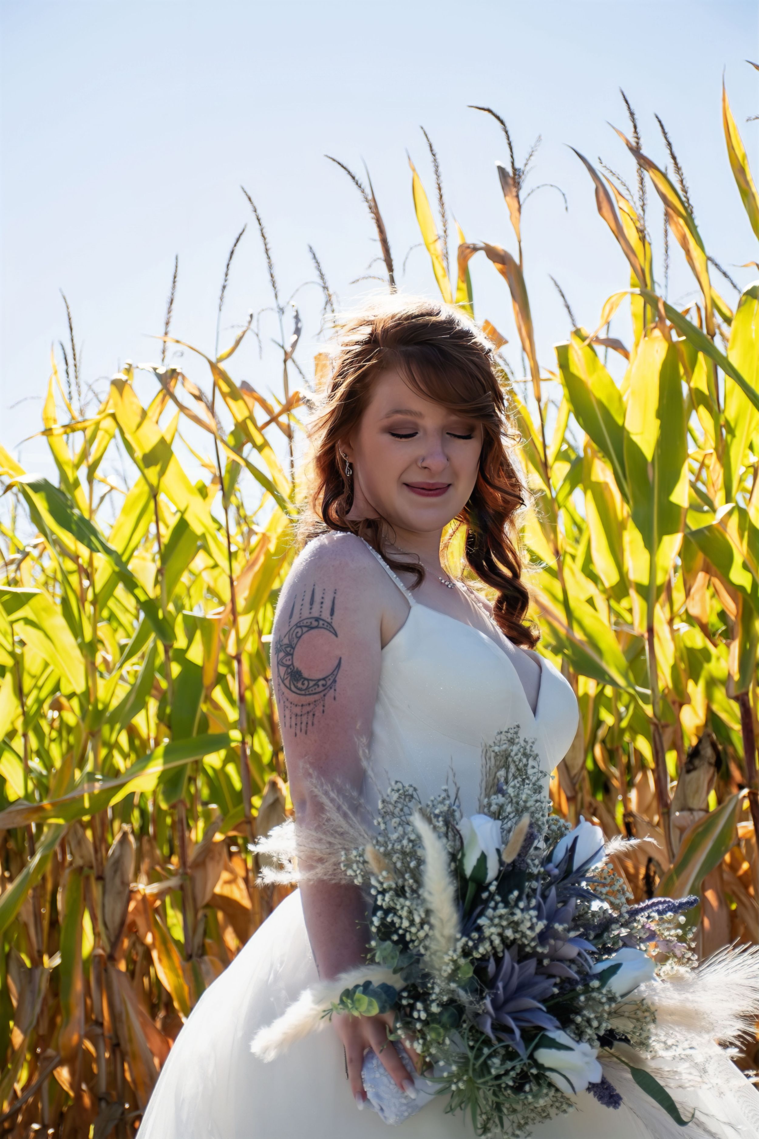 Bride and groom. wedding by corn field