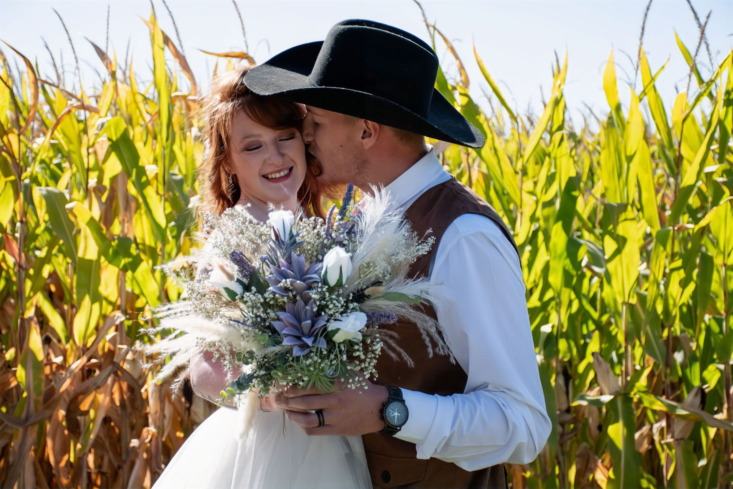 Bride and groom. wedding by corn field
