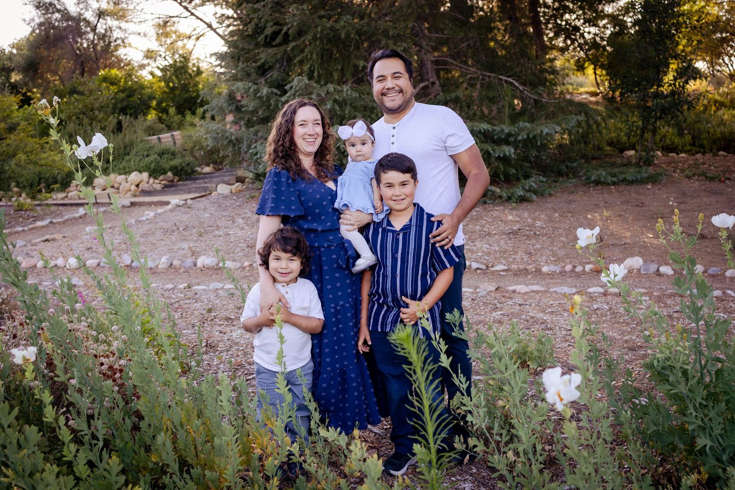 California film photographer Holly Castillo with her family, showcasing her authentic approach to photography.