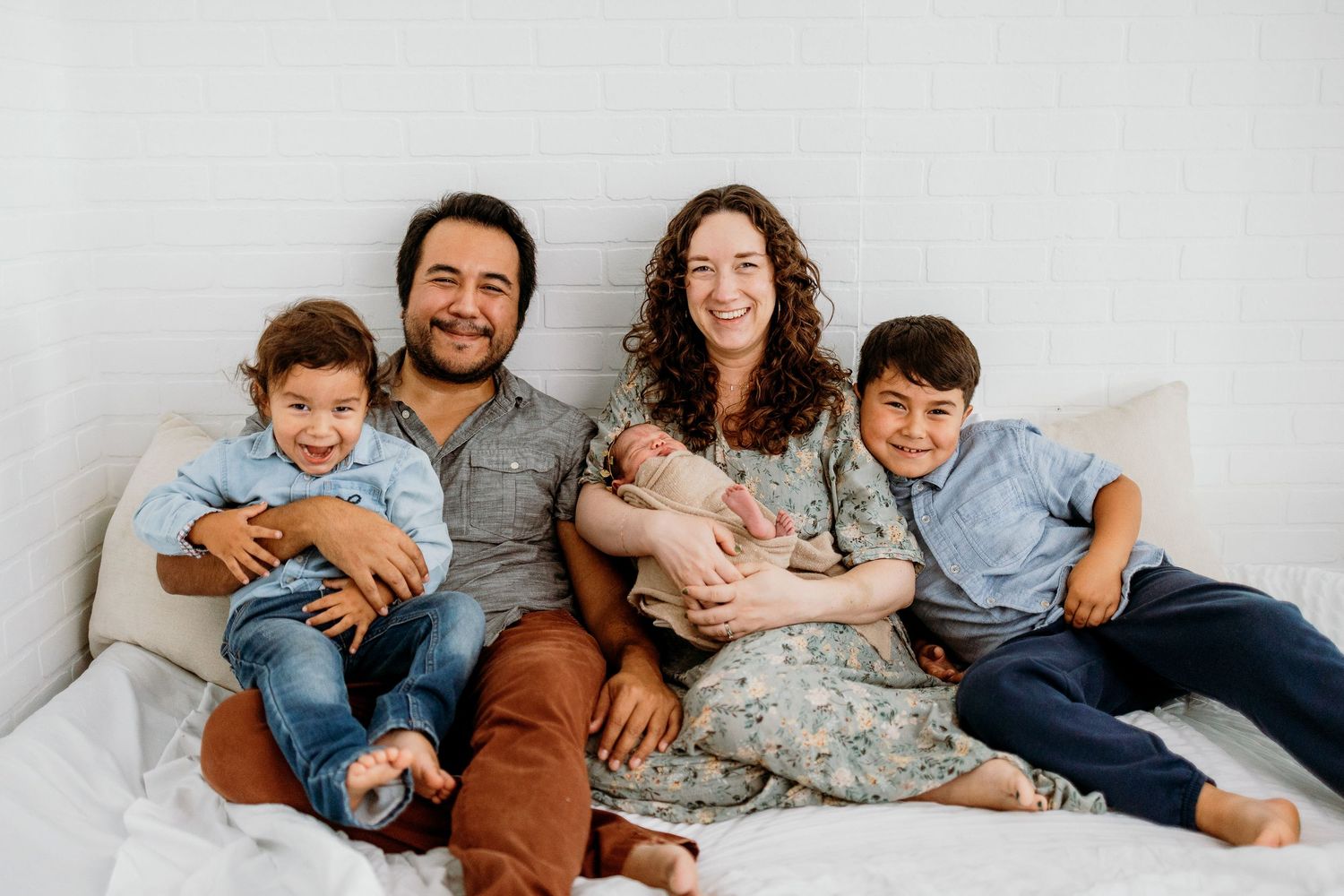 California film photographer Holly Castillo with her family, showcasing her authentic approach to photography.