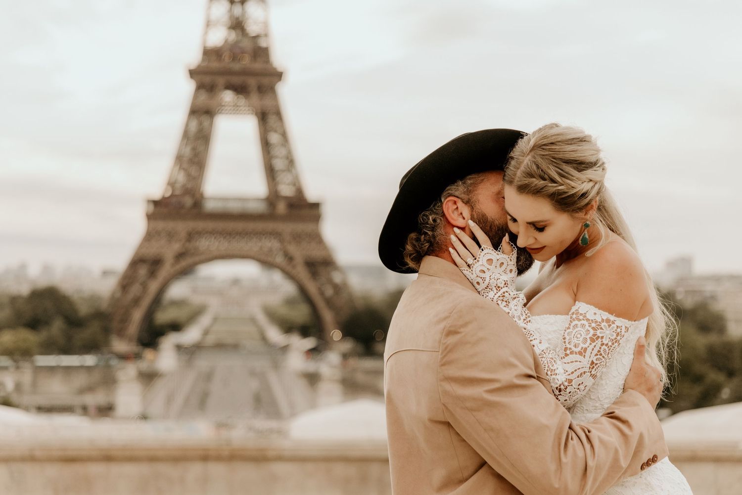Intimate couple portraits captured at Trocadero Square with the Eiffel Tower as backdrop.