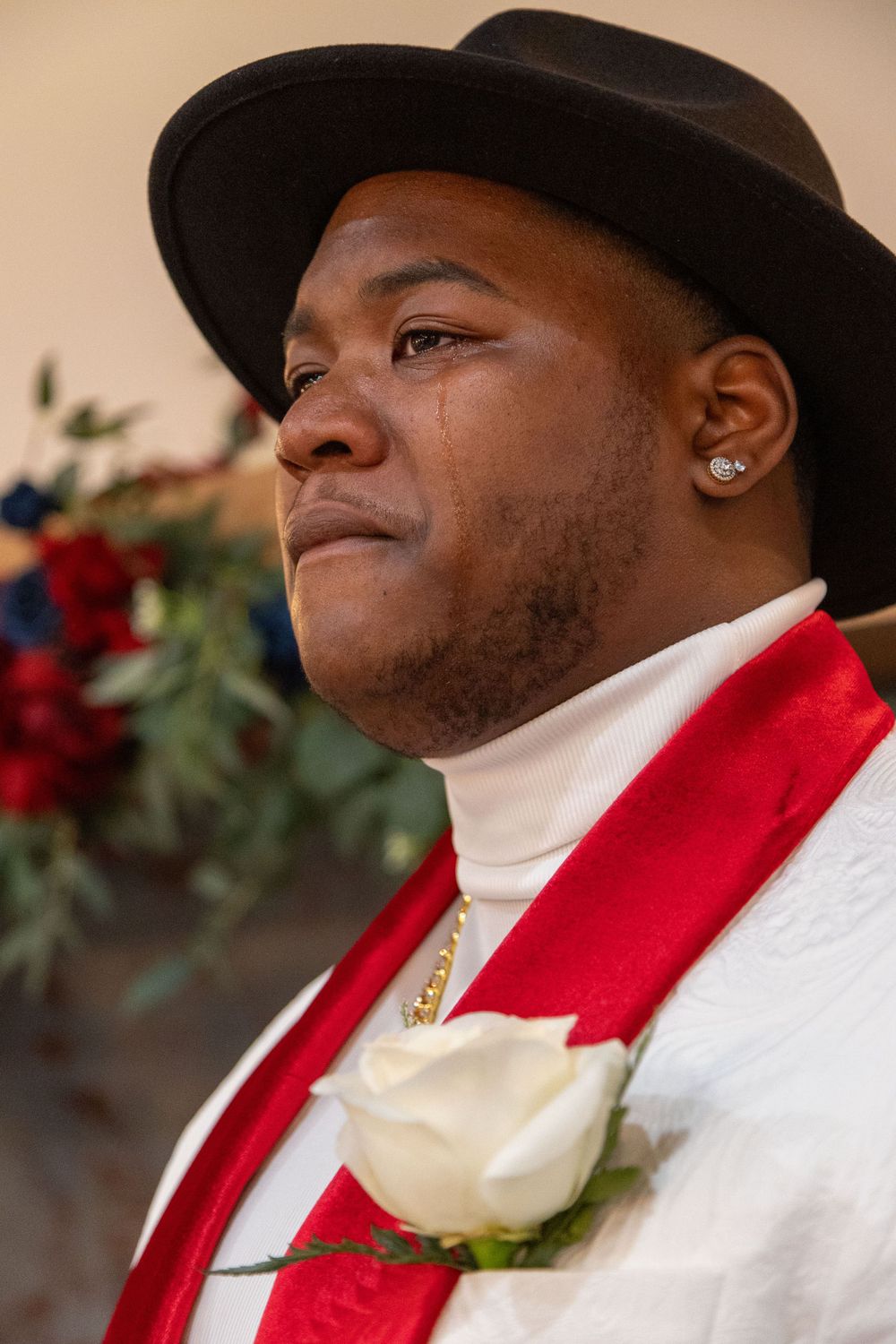 groom crying during first look of bride walking down aisle