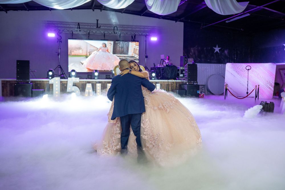 princess and father dancing in fog