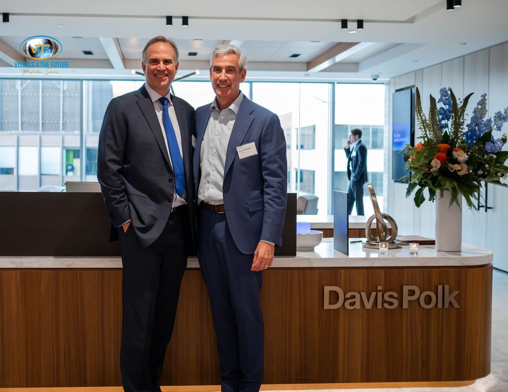 Professional office lobby with wood paneling and DavisPolk signage visible in background.