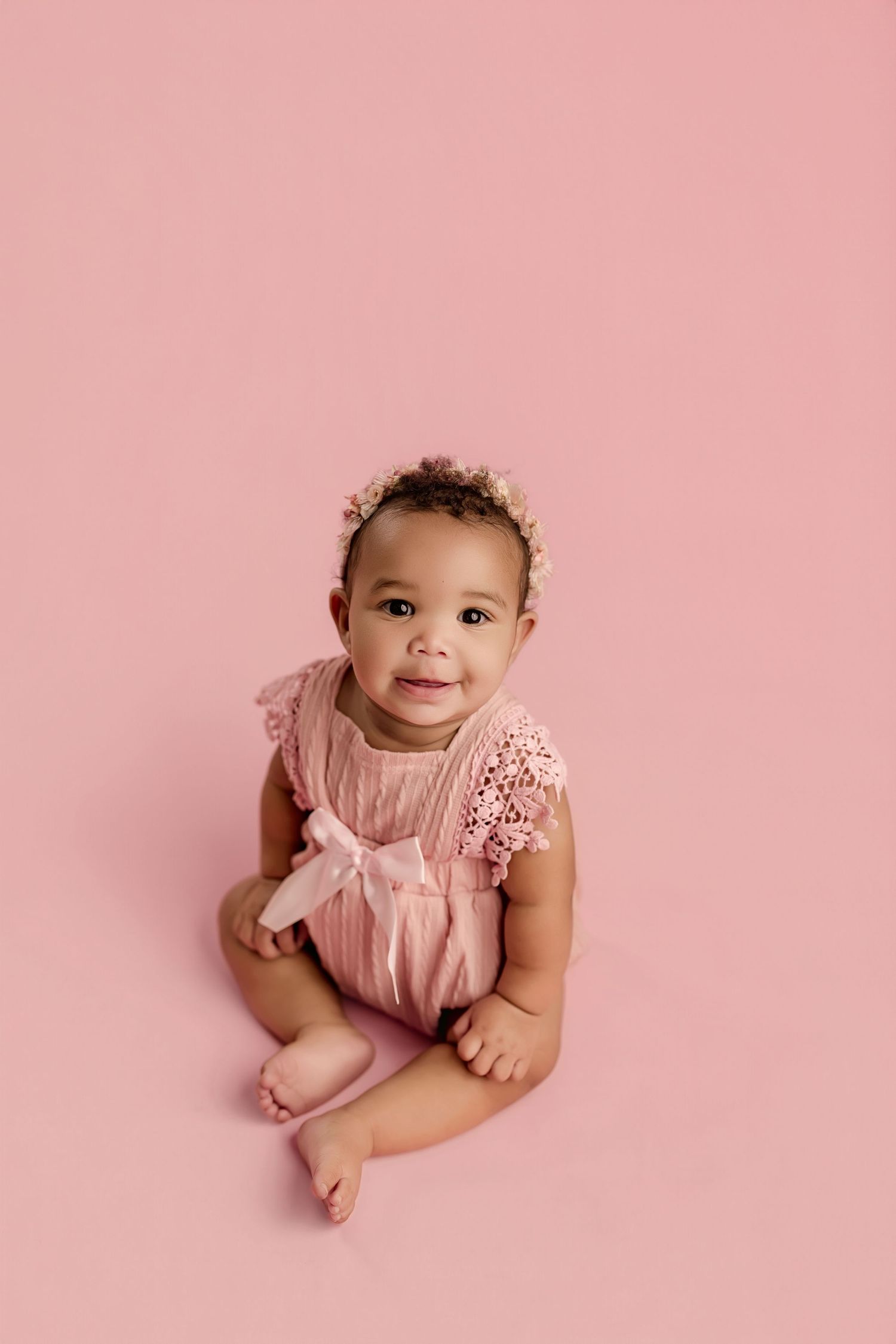 Milestone baby photography in Magnolia TX capturing timeless sitter and first year portraits