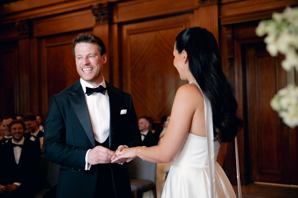 Old Marylebone town hall London Romantic classic civil wedding in wood-paneled ballroom.