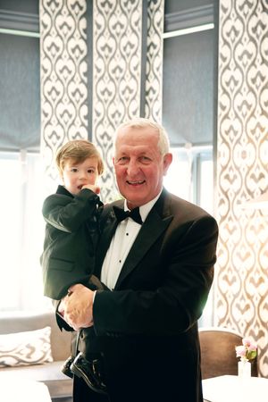 Wedding guests in formal attire sharing joyful moments at an elegant reception,The Franklin Boutique Hotel Starthotels Collezione