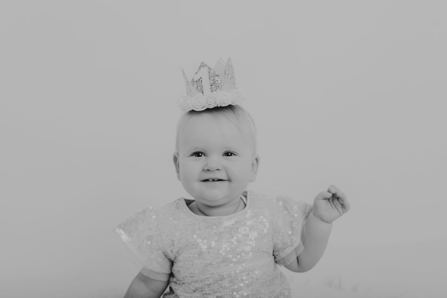 Sweet monochrome portrait of an infant in light coloured clothing. Photographer. Hull. East Yorkshire. Photography