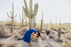 Desert landscape family photography session featuring majestic saguaro cacti.