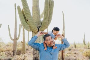 Candid moments captured in sequence against Arizona's iconic saguaro desert landscape.