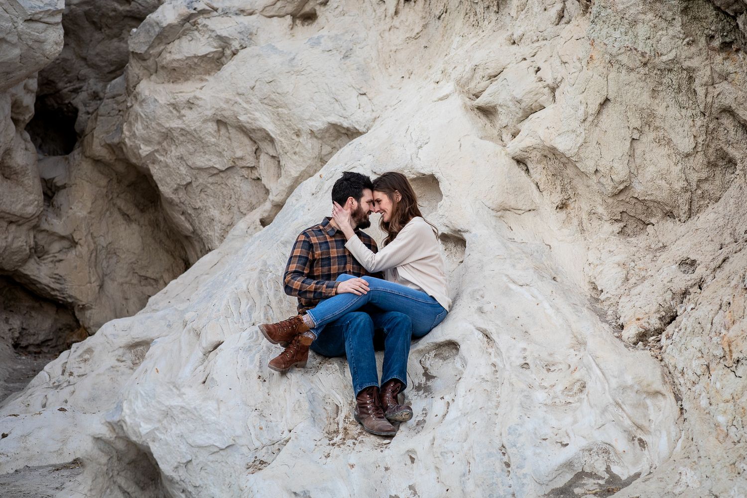 Beautiful outdoor engagement photography; couple embracing in New Mexico landscape; Clarissa Anello
