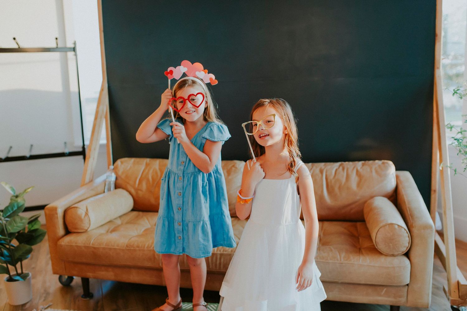 Playful studio portraits with light blue and white dress combinations.