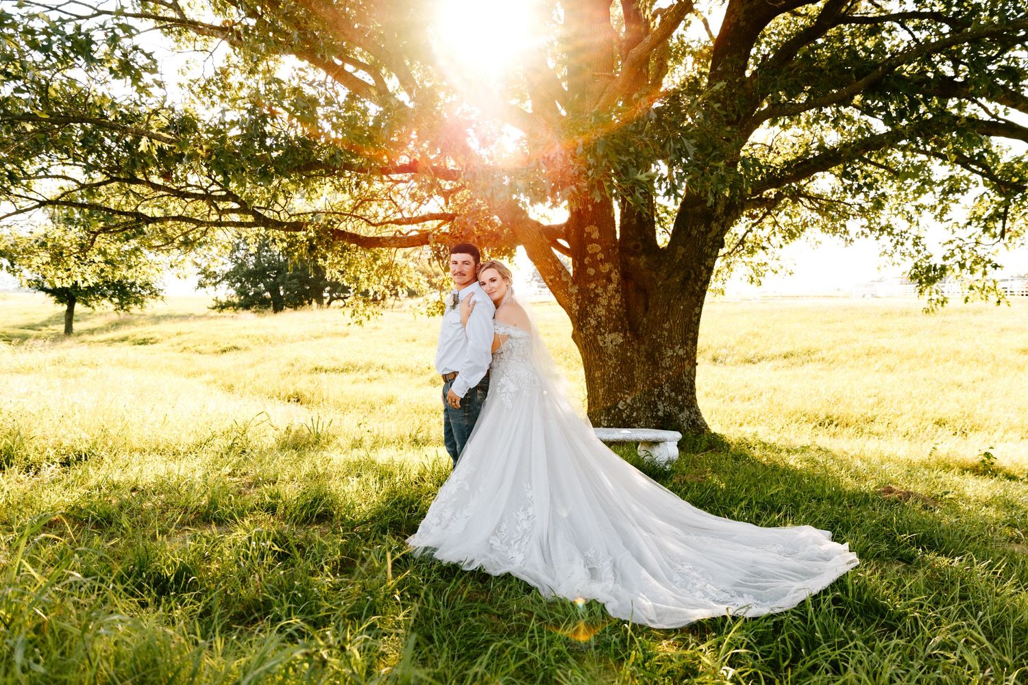 A couple pose for their wedding portraits on their wedding day in Eufaula, Oklahoma.