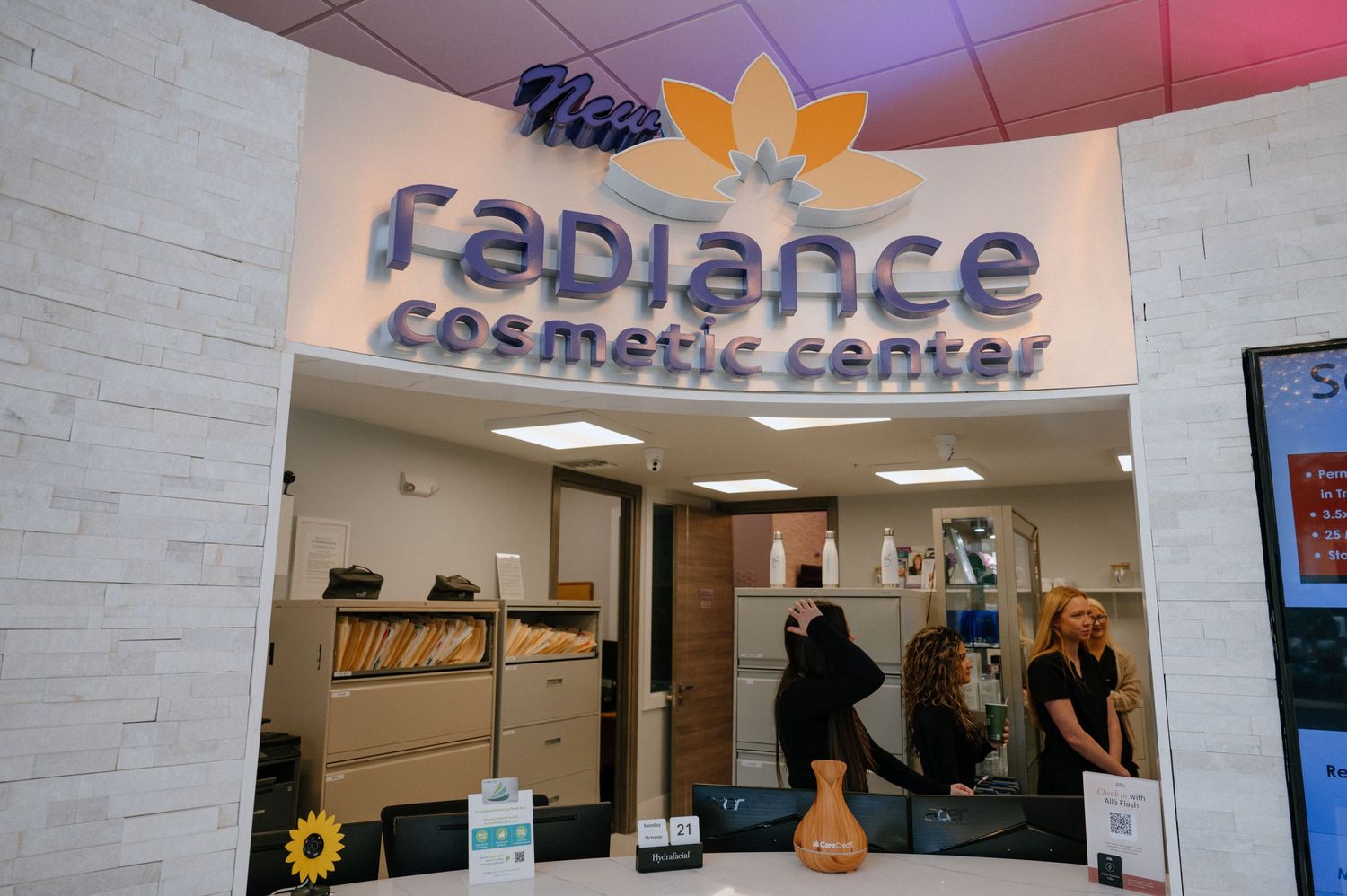 Radiance Cosmetic Center storefront with illuminated sign and modern entrance.