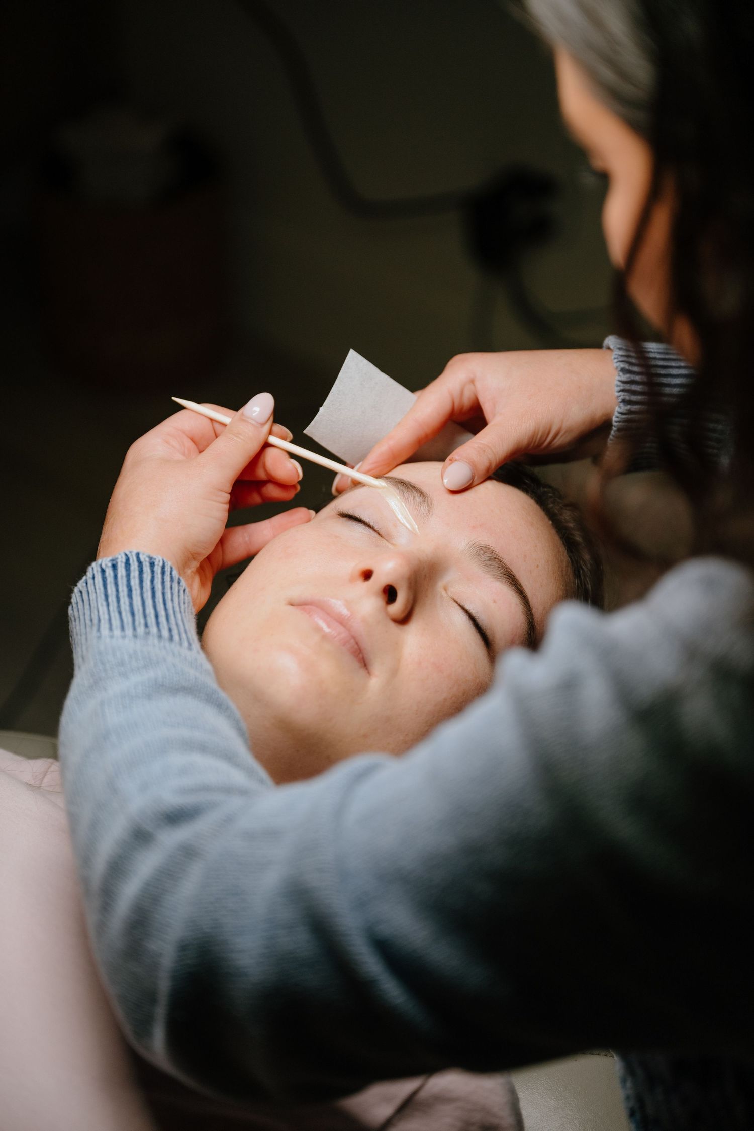 Close up of an aesthetic treatment being performed on client.
