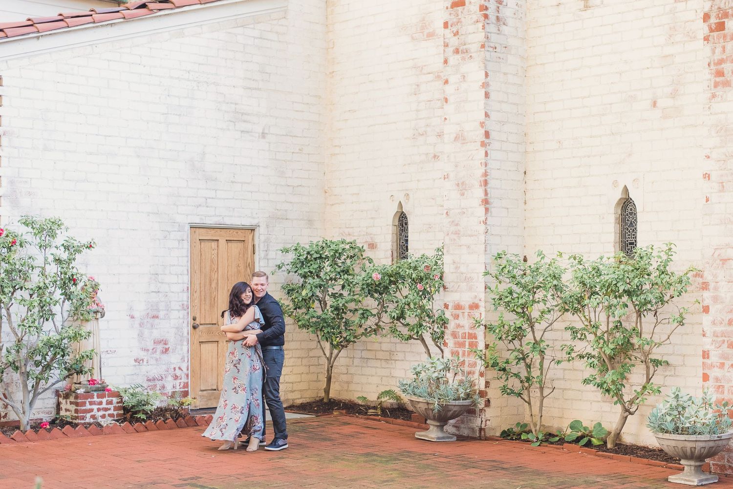 Couple Dancing in European Courtyard