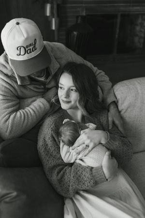 Black and white series of intimate lifestyle photos showing gentle embraces and genuine emotions.
