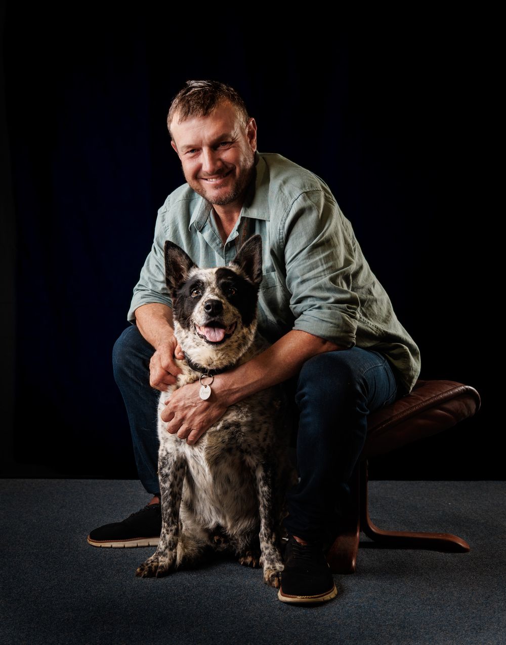 Man with his dog during a senior pet portrait session