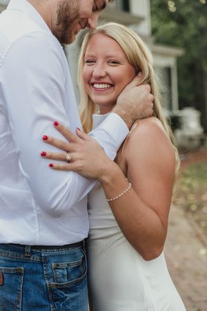 A romantic sequence of photos showing a couple embracing and sharing joyful moments together outdoors.