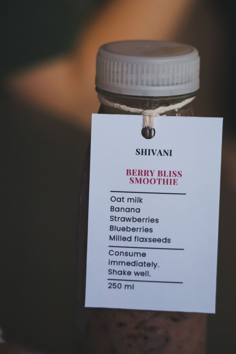 Berry Bliss Smoothie bottle with ingredient label for Shivani, 250ml.