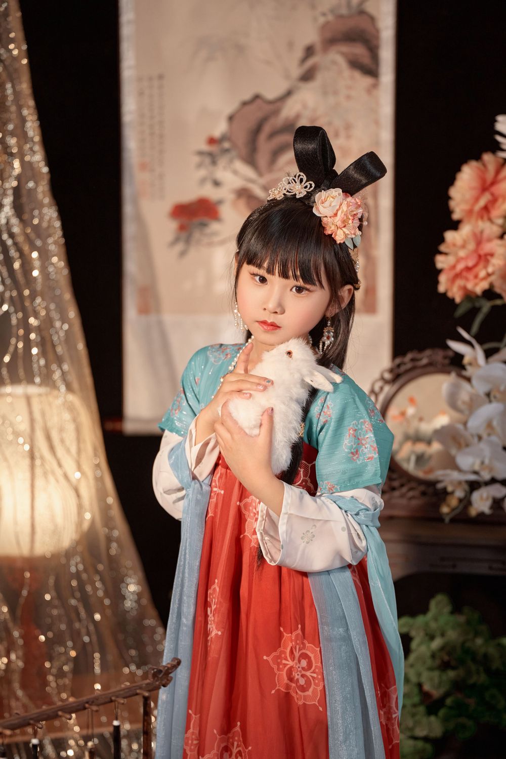 Cute children's studio portrait in an elegant Tang Dynasty Hanfu with dazzling golden props, by Imagine Image Studio.