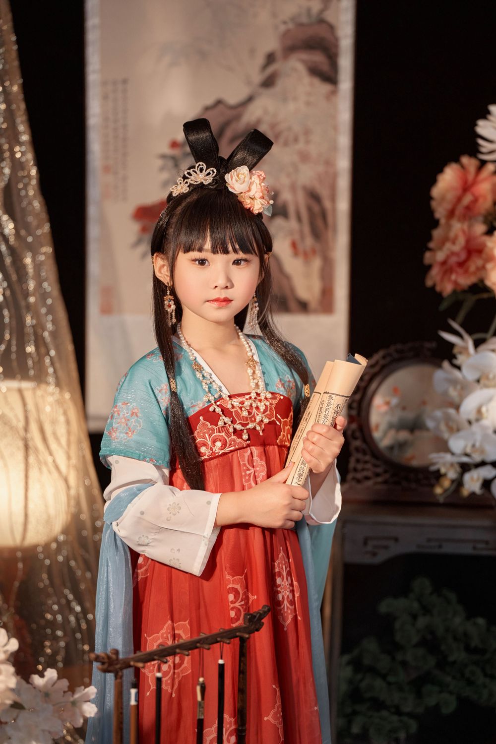 Cute children's studio portrait in an elegant Tang Dynasty Hanfu with dazzling golden props, by Imagine Image Studio.