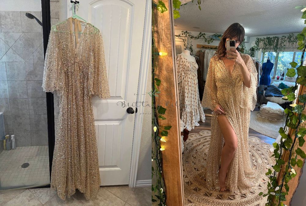 Elegant sheer beige lace maxi dress shown on a hanger and in mirror reflection with twinkle lights in background.