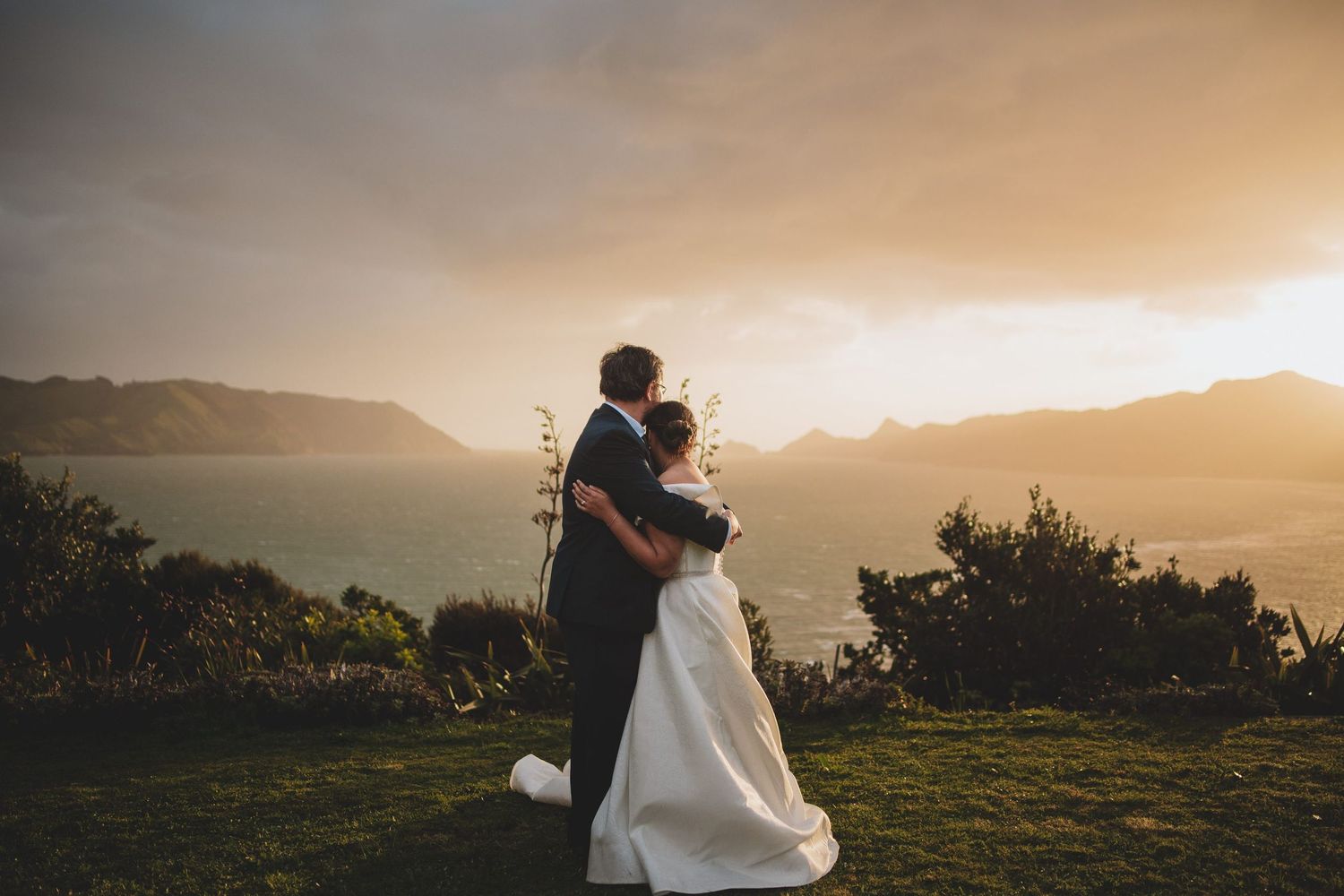 Backyard wedding sunset shoot atop a hill. Auckland wedding photographer.