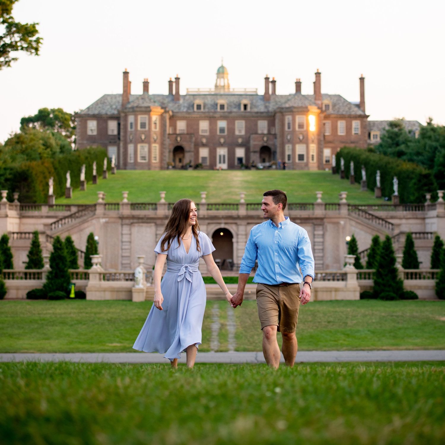 Elegant estate grounds provide stunning backdrop for romantic afternoon portraits.