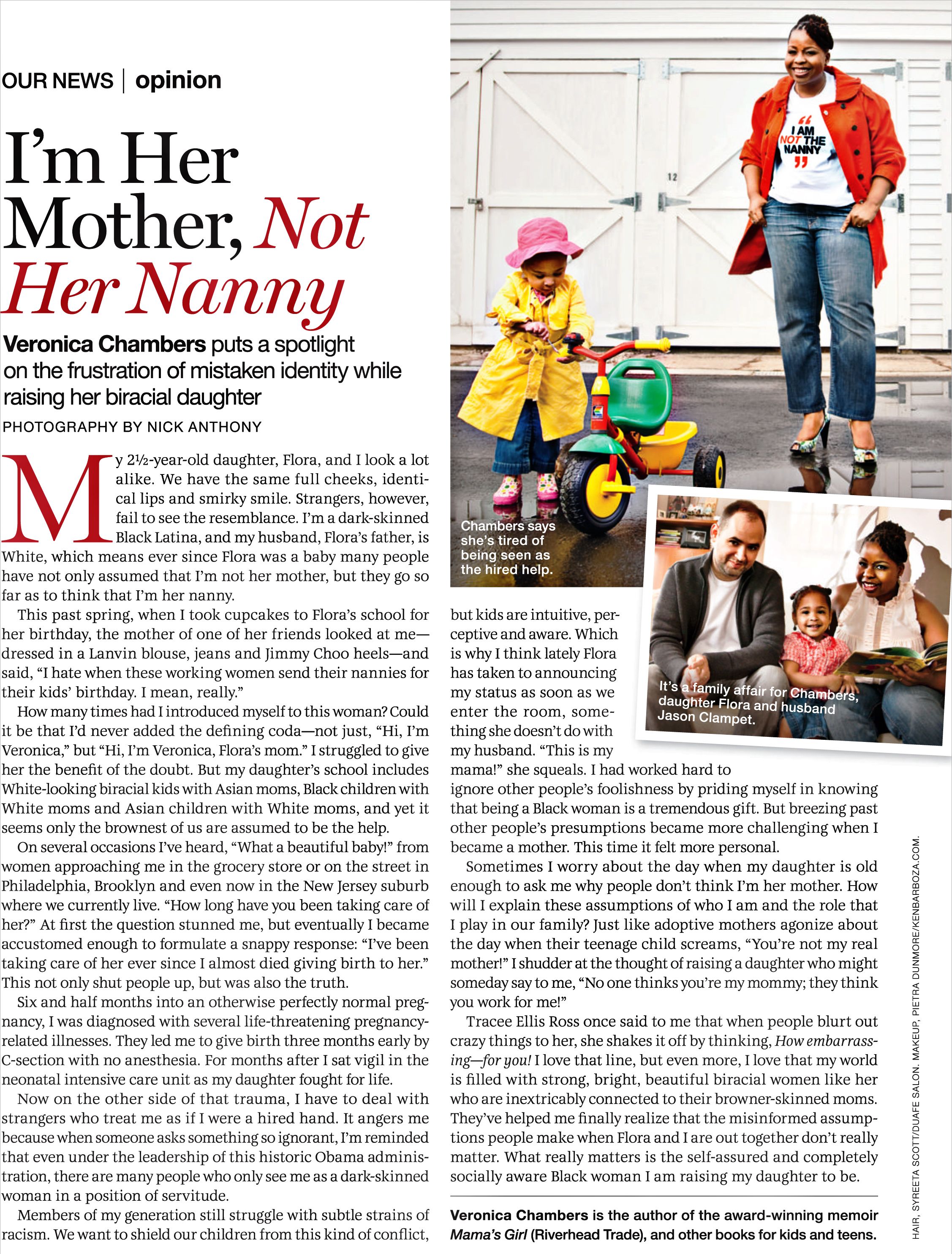 A Black mother smiles warmly with her biracial daughter in a magazine article about mistaken identity.