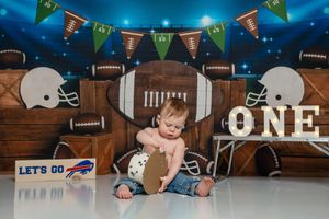 A series of football-themed first birthday party photos with decorations, banners, and sports elements on wooden backgrounds.