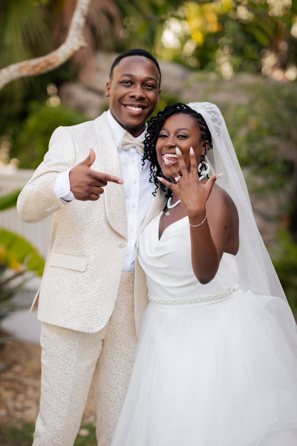 A newly married couple shares joyful moments and laughter in a series of outdoor wedding photos.