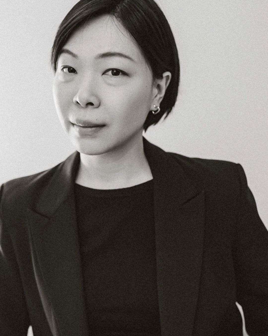 Portrait of Eva Q, Toronto wedding photographer known for candid and romantic storytelling.
