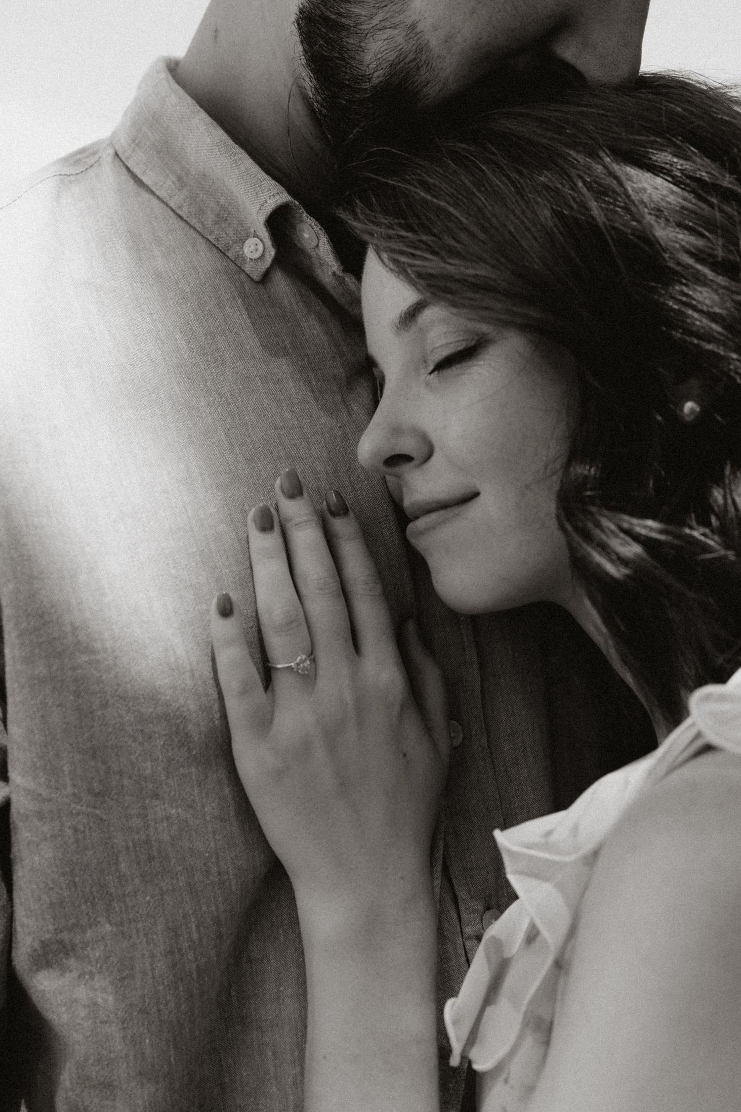 Black and white series capturing intimate romantic moments between a couple.