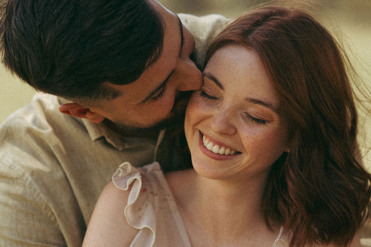 A series of candid moments showing a couple's joyful interaction in warm sunlight.