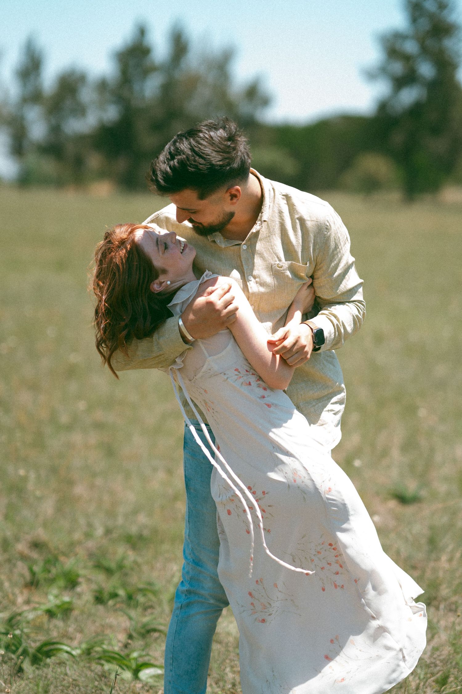 Romantic dance sequence showing fluid movement and connection between two people in a field.
