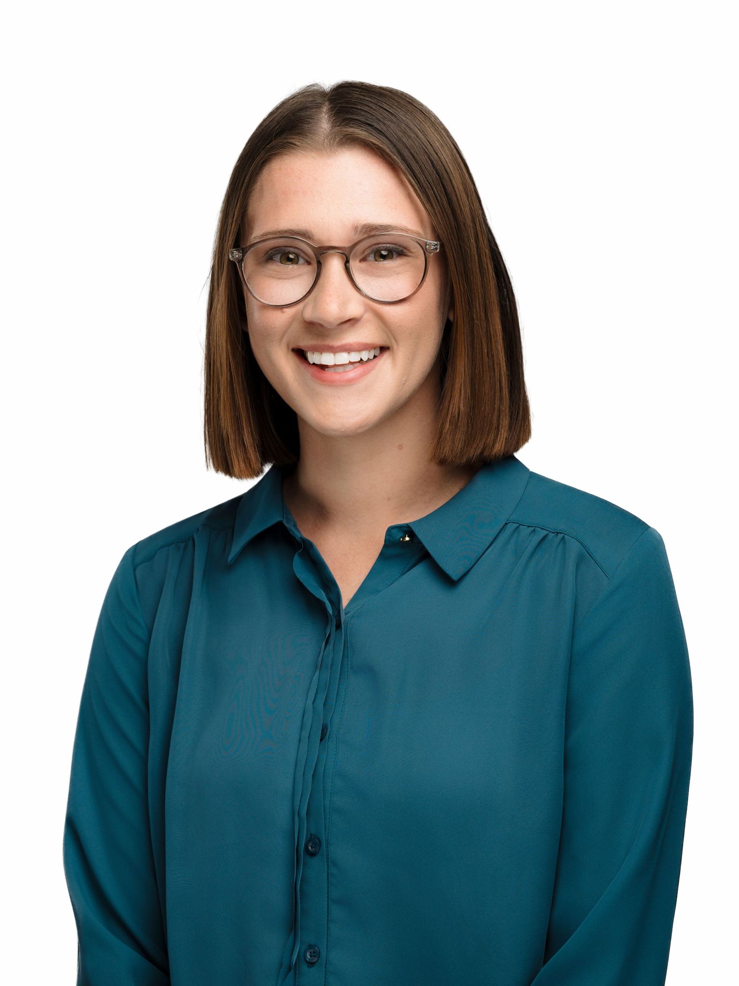 Professional headshots of a person wearing glasses and a teal collared shirt against a white background.