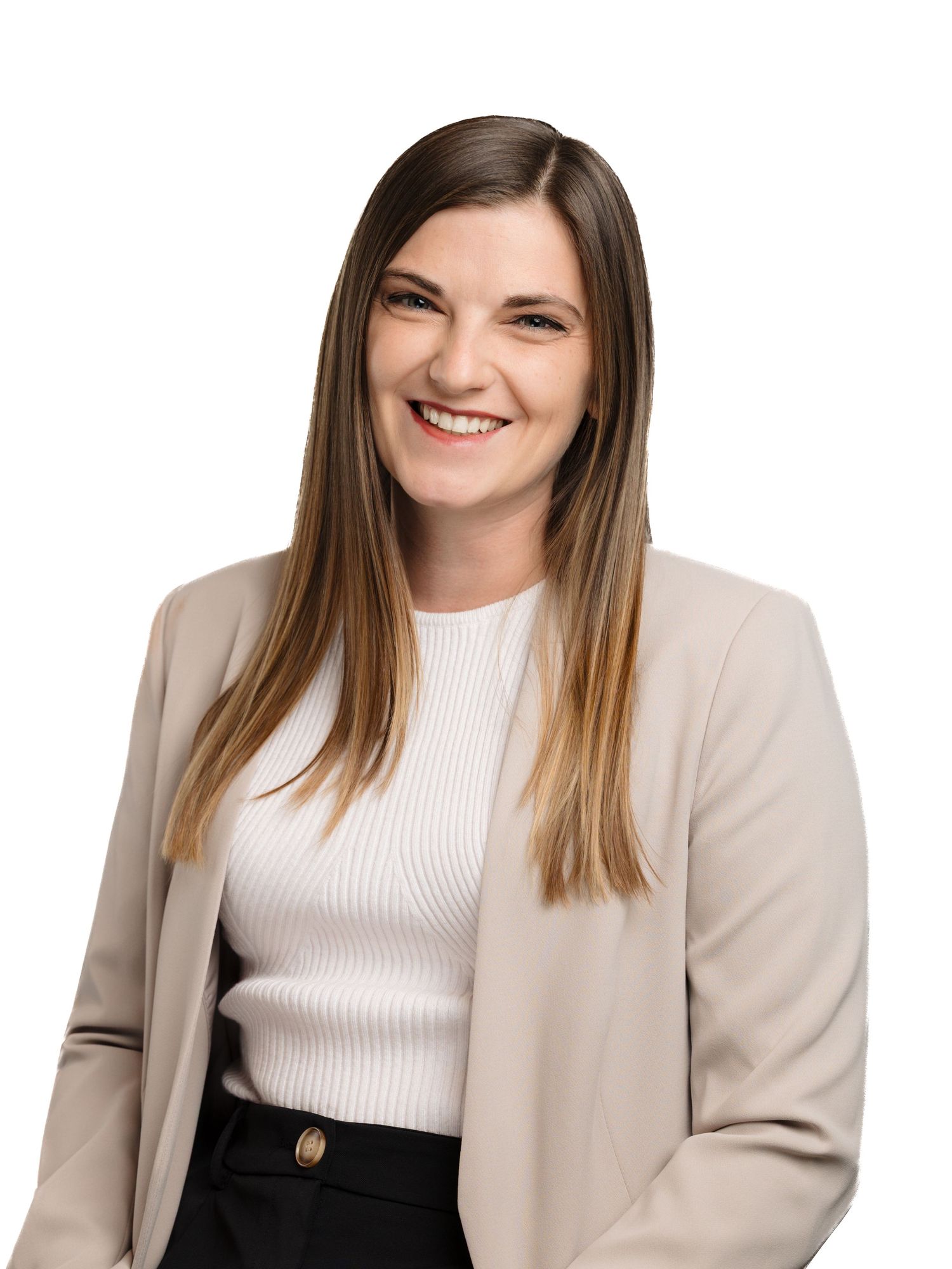 Professional headshot of someone in a cream blazer and white ribbed top smiling warmly against a white background.