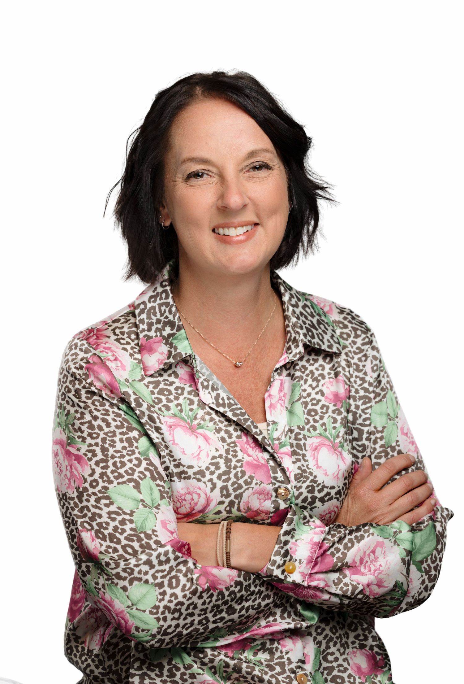 Woman in leopard print and floral pattern blouse poses in multiple shots showing different expressions and angles.