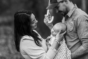 A mother and father with their baby