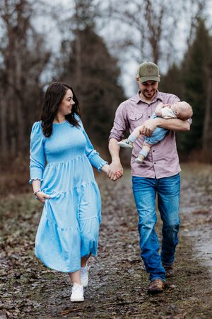 Mom and dad holding their baby