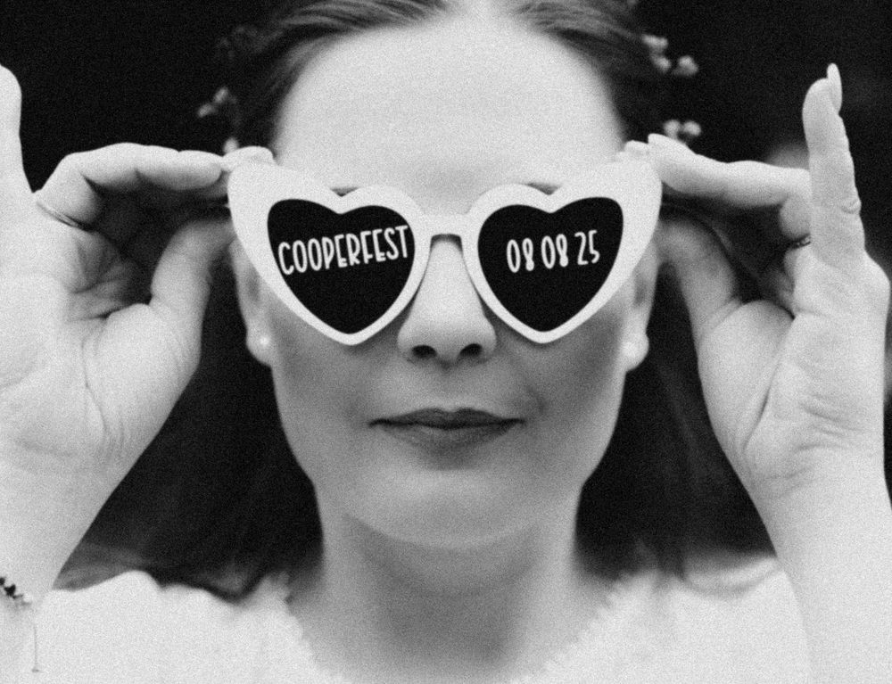 A creative photo series showing different smiles drawn on paper held in front of someone's mouth.