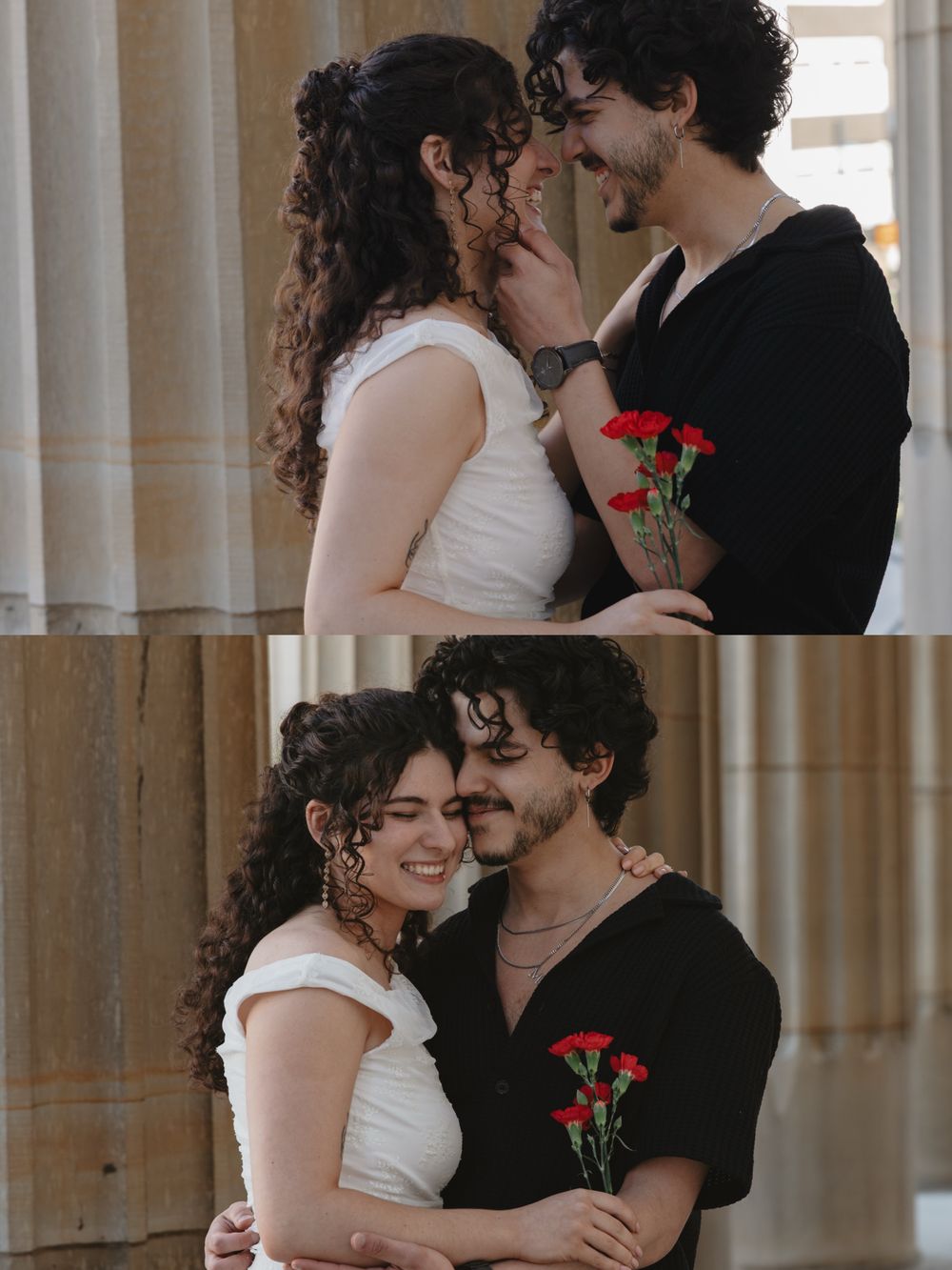 Romantic couple sharing a tender moment with red carnations, woman in white dress and man in black shirt embracing near stone columns.